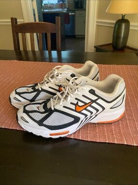 Nike Air Pegasus White and Black Running Shoes with Orange Swoosh